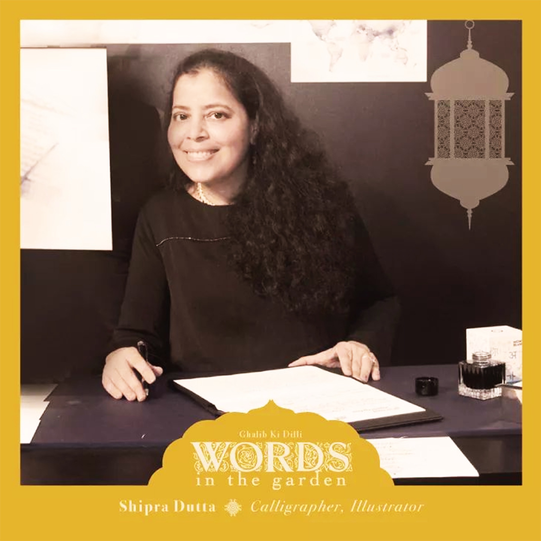 Likhawat calligrapher at her writing desk with pen and inkwell, promoting the Ghalib Ki Dilli: Words in the Garden event