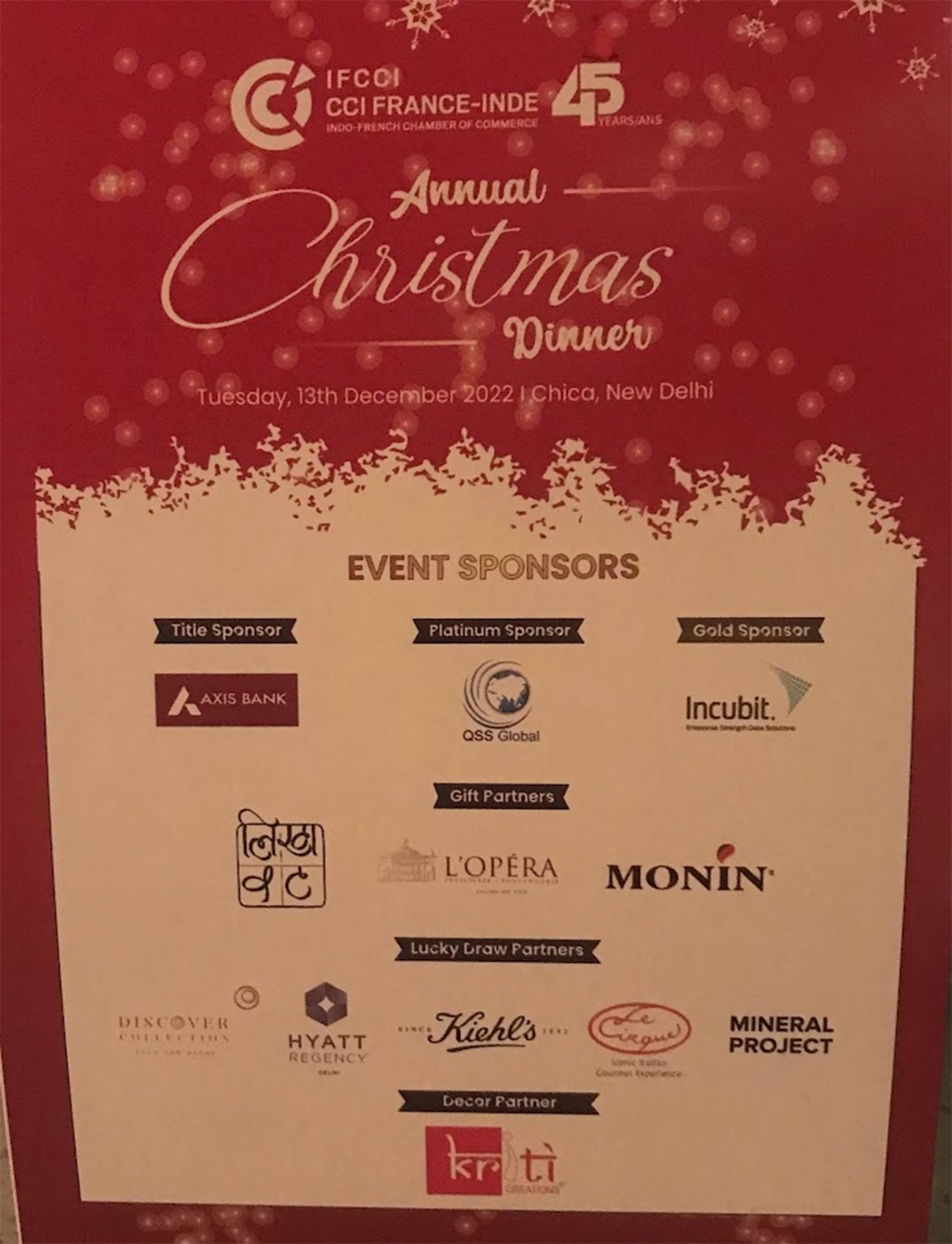 Event sponsor board listing Likhawat as a gift partner for the IFCCI Annual Christmas Dinner