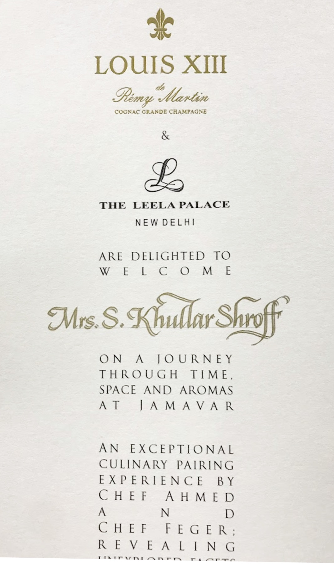 Gold foil invitation for a Louis XIII de Remy Martin and The Leela Palace New Delhi event, with the guest's name set in gold calligraphy